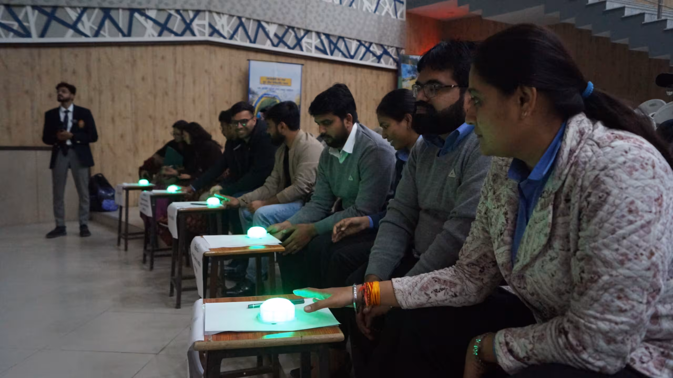 Quiz teams at their buzzers during a Quiz Granny competition